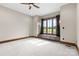 This serene bedroom offers a window seat overlooking a lush, green landscape and is filled with natural light at 1822 Irby Rd, Monroe, NC 28112