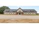 Large barn with a metal roof and wood accents at 1822 Irby Rd, Monroe, NC 28112