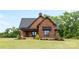 Cozy home with a porch and a beautiful yard at 1822 Irby Rd, Monroe, NC 28112
