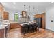 Spacious kitchen with a large island, pendant lighting, and modern appliances at 1822 Irby Rd, Monroe, NC 28112