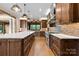 Kitchen with wood cabinets, stainless appliances, large island with white countertop at 1822 Irby Rd, Monroe, NC 28112