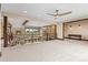 A spacious loft area features wood beams, stylish railings, and views of the landscape beyond at 1822 Irby Rd, Monroe, NC 28112