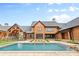 A backyard pool features an attached outdoor living area at 1822 Irby Rd, Monroe, NC 28112
