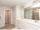 Bright bathroom featuring double sinks, ample counter space, and tiled floors at 1914 Loggerhead Dr, Lancaster, SC 29720
