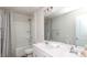 Well-lit bathroom features a double sink vanity, tub-shower combo with neutral-patterned shower curtain at 1914 Loggerhead Dr, Lancaster, SC 29720