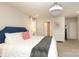 Bright bedroom with luxurious bed, decorative chandelier, and neutral decor at 1914 Loggerhead Dr, Lancaster, SC 29720