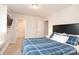 Comfortable bedroom with large bed, bedside table, and a decorative flatscreen, exudes warmth and style at 1914 Loggerhead Dr, Lancaster, SC 29720