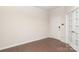 Bright living area features wainscoting, wood floors, and lots of natural light at 1914 Loggerhead Dr, Lancaster, SC 29720