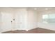 Bright living area features wainscoting, wood floors, and lots of natural light at 1914 Loggerhead Dr, Lancaster, SC 29720