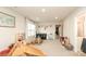 Inviting playroom features a play kitchen, table and ample natural light for creative activities at 1914 Loggerhead Dr, Lancaster, SC 29720