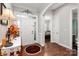 Entryway with hardwood floors, a decorative rug, and an open view to the main living space at 2021 Pinyon Ln, Lancaster, SC 29720