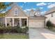 Charming home with a well-manicured lawn, a two-car garage, and inviting front porch at 2021 Pinyon Ln, Lancaster, SC 29720