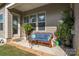 Relaxing covered patio with comfortable seating, perfect for outdoor enjoyment at 2021 Pinyon Ln, Lancaster, SC 29720