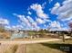 Scenic view of a walking path along a tranquil pond and lush greenery at 2021 Pinyon Ln, Lancaster, SC 29720