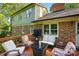 Enjoy the outdoors on this inviting deck, complete with comfortable seating and a view of the well-maintained yard at 2025 Sagamore Rd, Charlotte, NC 28209