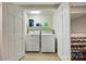 Laundry room with washer and dryer closet and shelving for cleaning supplies at 2025 Sagamore Rd, Charlotte, NC 28209