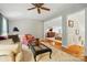 Spacious living room showcasing hardwood floors and an open layout with view into adjacent areas at 2025 Sagamore Rd, Charlotte, NC 28209