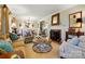 Inviting living room with fireplace, neutral decor, and hardwood floors at 2025 Sagamore Rd, Charlotte, NC 28209