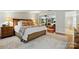 Serene main bedroom boasts hardwood floors with an open layout into the living area at 2025 Sagamore Rd, Charlotte, NC 28209