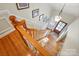 Wooden staircase, viewed from above, leads to the main entry with a stylish front door at 2025 Sagamore Rd, Charlotte, NC 28209