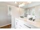 Bathroom features dual sinks, modern fixtures, ample lighting, and a glass-enclosed shower at 204 Pebble Creek Xing, Fort Mill, SC 29715