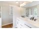 Primary bathroom features modern fixtures, double sink vanity, large mirror, ample light, and shower at 204 Pebble Creek Xing, Fort Mill, SC 29715