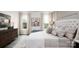 Comfortable bedroom with decorative moulding, neutral decor, and natural light at 2066 Skyhawk Dr, York, SC 29745