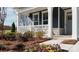 Charming front porch with stone details, flower beds, and inviting curb appeal at 2066 Skyhawk Dr, York, SC 29745