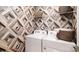 Well-organized laundry room with modern machines, stylish wallpaper, and ample storage at 2066 Skyhawk Dr, York, SC 29745