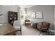 Charming office space featuring a wooden desk, sitting area, and soft neutral colors at 2066 Skyhawk Dr, York, SC 29745
