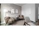 Cozy sitting area with comfortable chairs, elegant decor, and neutral color palette at 2066 Skyhawk Dr, York, SC 29745