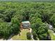 Aerial view of home featuring an in-ground pool and lush landscaping at 219 Proctor Dr, Salisbury, NC 28147