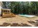 Beautiful backyard with a newly built wooden deck and inviting in-ground pool at 219 Proctor Dr, Salisbury, NC 28147