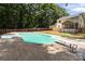 Large in-ground swimming pool, hot tub, and diving board in a spacious backyard at 219 Proctor Dr, Salisbury, NC 28147