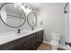 Bathroom with double vanity, modern fixtures and lighting at 219 Proctor Dr, Salisbury, NC 28147