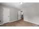 Bedroom with neutral walls, wood-look floors and stairway at 219 Proctor Dr, Salisbury, NC 28147
