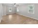 Bright bedroom features neutral paint, ceiling fan, and natural light at 219 Proctor Dr, Salisbury, NC 28147