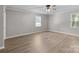 Bedroom featuring a ceiling fan and two large windows bringing in lots of light at 219 Proctor Dr, Salisbury, NC 28147