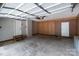 Spacious garage with concrete flooring and white doors leading to the interior at 219 Proctor Dr, Salisbury, NC 28147