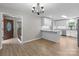 Bright eat-in kitchen features white cabinets, stainless appliances, and granite countertops at 219 Proctor Dr, Salisbury, NC 28147