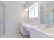 Bright bathroom featuring double vanity with white cabinets, and tile floors at 226 Gilead Rd, Huntersville, NC 28078