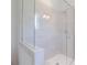 Tiled bathroom with glass shower and shower head at 226 Gilead Rd, Huntersville, NC 28078