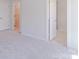 Neutral bedroom showing the entry to bathroom and walk-in closet at 226 Gilead Rd, Huntersville, NC 28078