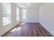 Clean and bright bedroom offering ample natural light and new, bare flooring at 226 Gilead Rd, Huntersville, NC 28078