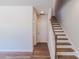 Inviting foyer featuring beautiful hardwood floors and a staircase with wooden treads at 226 Gilead Rd, Huntersville, NC 28078