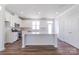 Modern kitchen featuring white cabinets, stainless steel appliances, and a kitchen island at 226 Gilead Rd, Huntersville, NC 28078