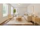 Bright living room with neutral décor, ample natural light, and stylish furnishings at 226 Gilead Rd, Huntersville, NC 28078