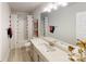 Well-lit bathroom with a large mirror, shower with curtain, and modern fixtures at 230 Mountain Island Dr # 39, Statesville, NC 28677