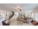 Open-concept living area with modern furnishings and seamless flow to kitchen and dining at 230 Mountain Island Dr # 39, Statesville, NC 28677