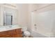 A well-lit bathroom with a vanity, mirror, and a tub-shower combo at 2324 Bonterra Blvd, Indian Trail, NC 28079